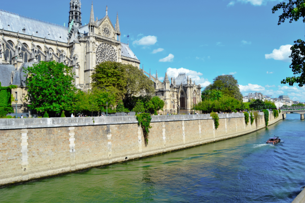 back of the notre dame cathedral and view of the Seine