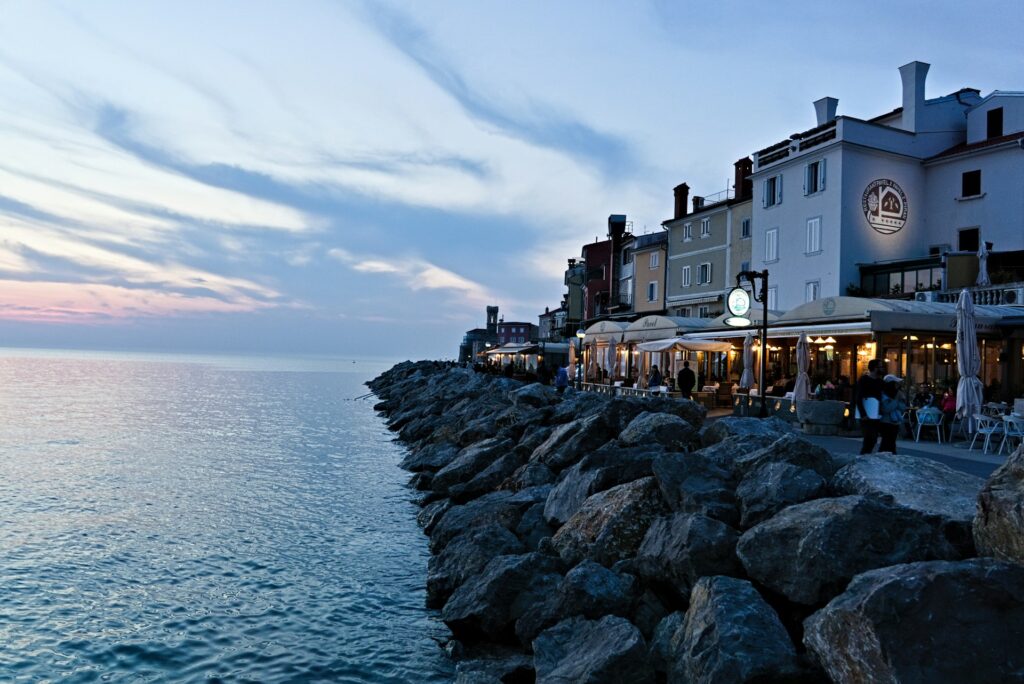 blue sky, restaurants on the rocks with sea view