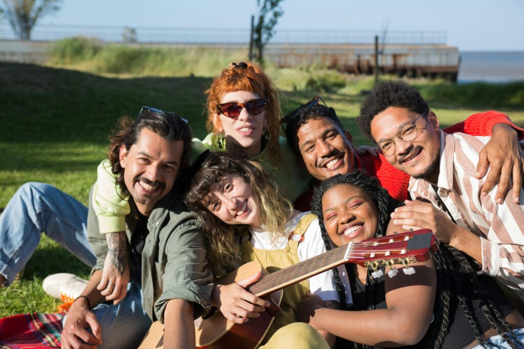 a group of people smiling and hugging each other