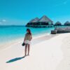 girl looking at blue sea