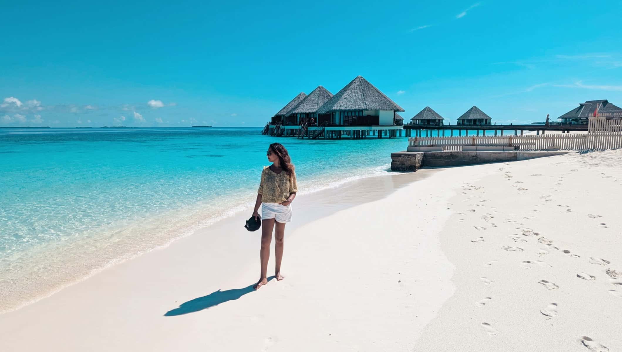 girl looking at blue sea